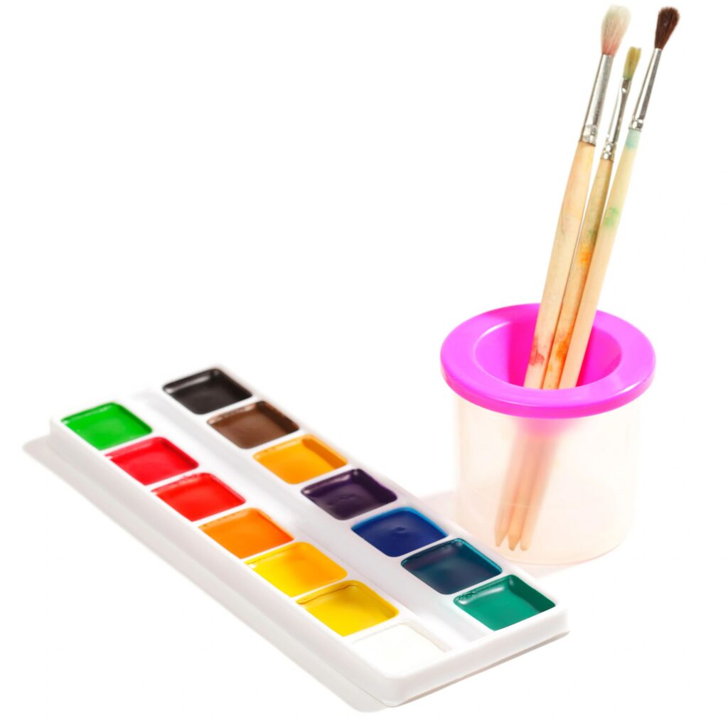 Dry aquarelle and paintbrushes